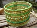 armband glaskraaltjes groen/geel 